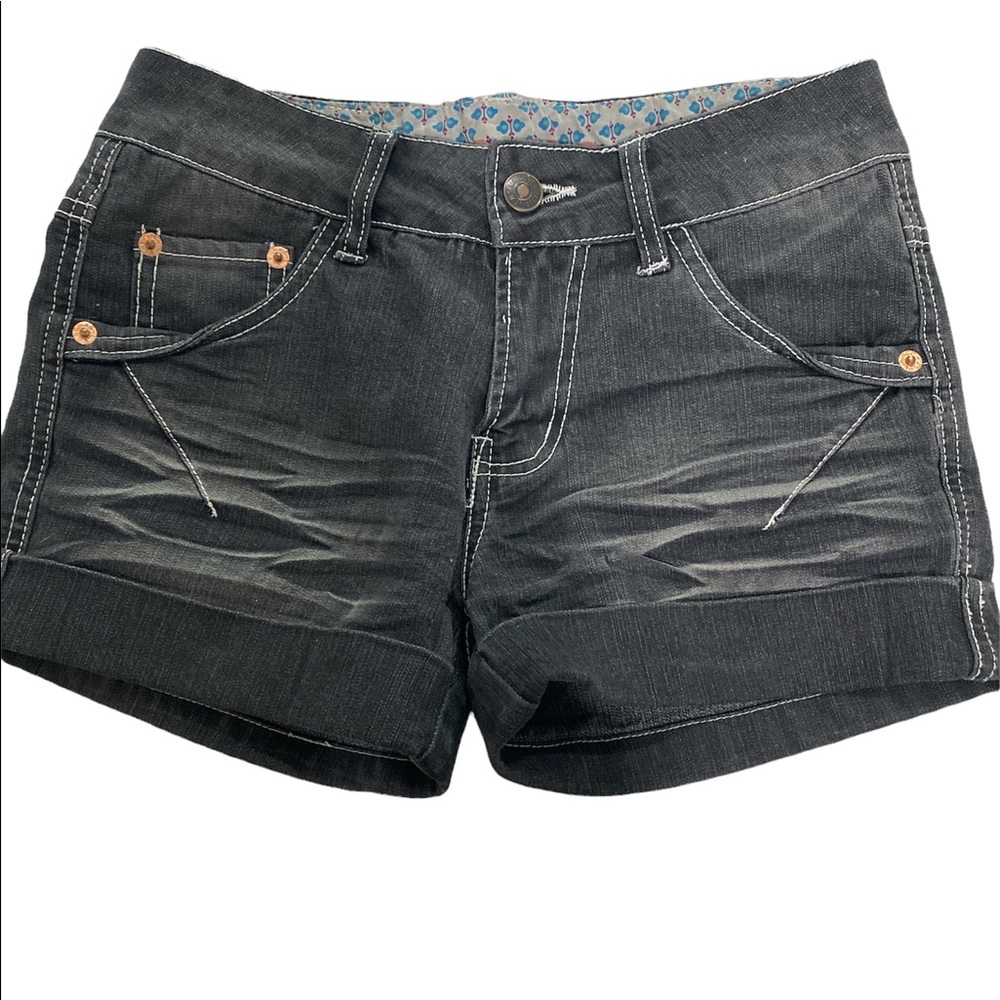 Levi’s faded black jean shorts size 0. These have very unique detail.